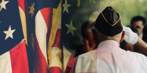 Veteran saluting American flag